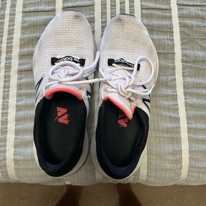 White, pink, & black new balance sneakers